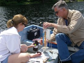 Jim and Cherie P. taking water samples for chlorophyll a and total phosphorus at Lake Howard